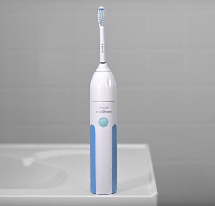 philips sonicare essense 5300 toothbrush sitting on sink