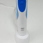 white and blue oral-b pro 500 on the table